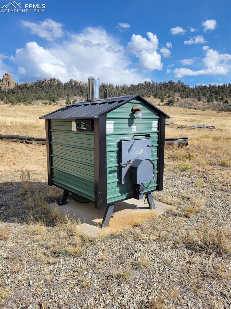 Outdoor Woodmaster heating unit/wood boiler