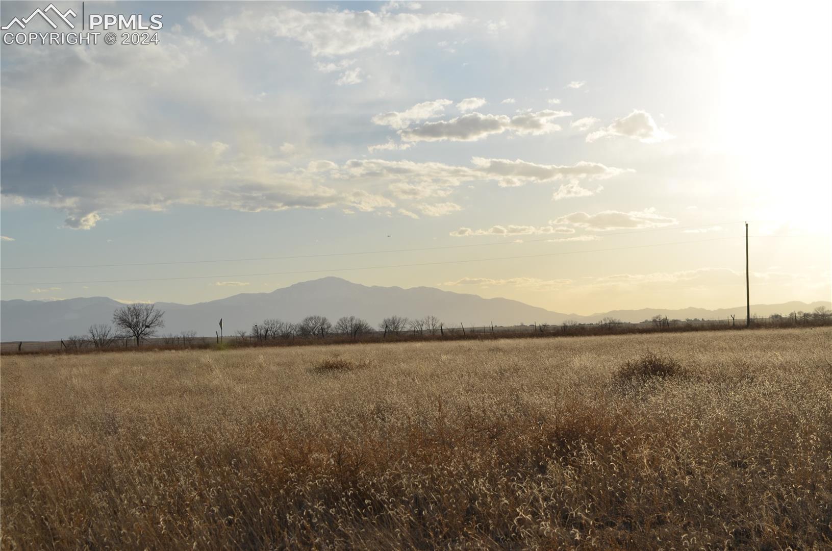 View of mountain feature with a rural view