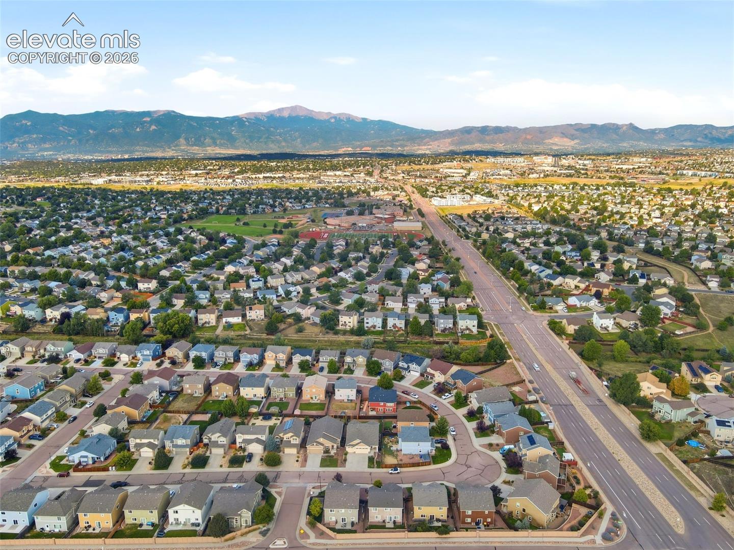 Expansive residential neighborhood with mountain backdrop