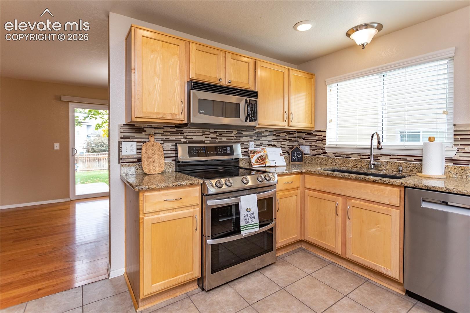 Kitchen featuring all stainless steel appliances.  Bosch dishwasher.