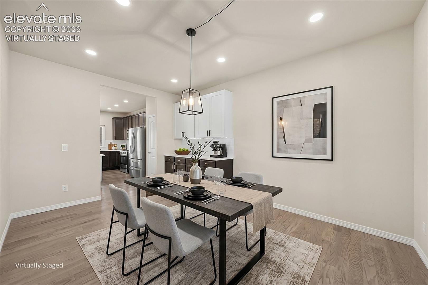 Dining Room with additional cabinetry. Virtually Staged.