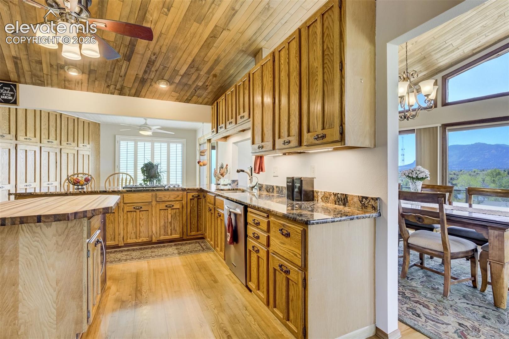 Sink wall has pass through to dining room.