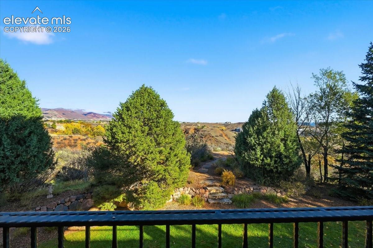 This breathtaking yard offers an outdoor oasis just steps from your home. 