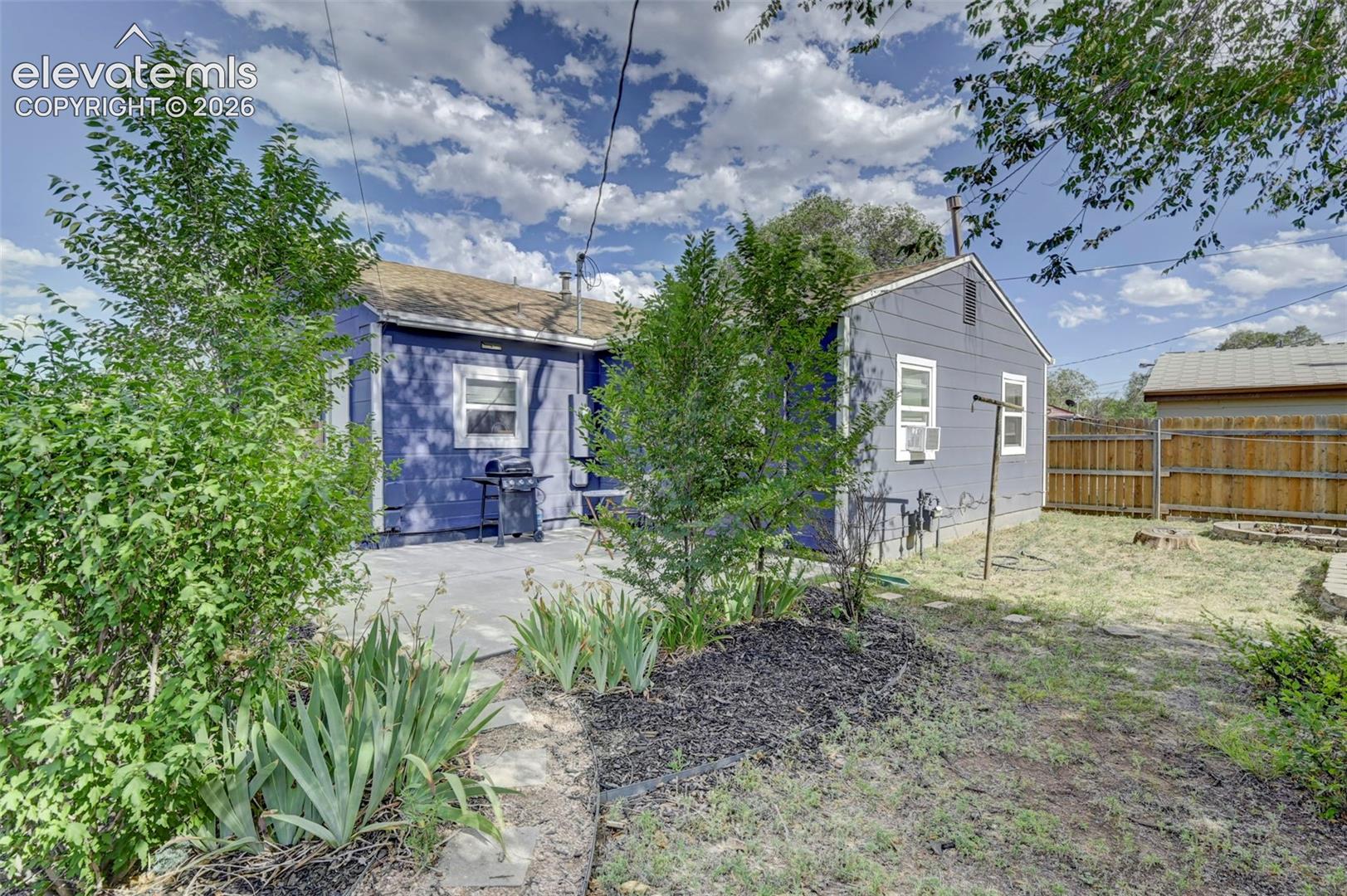 View of home's exterior with a patio area