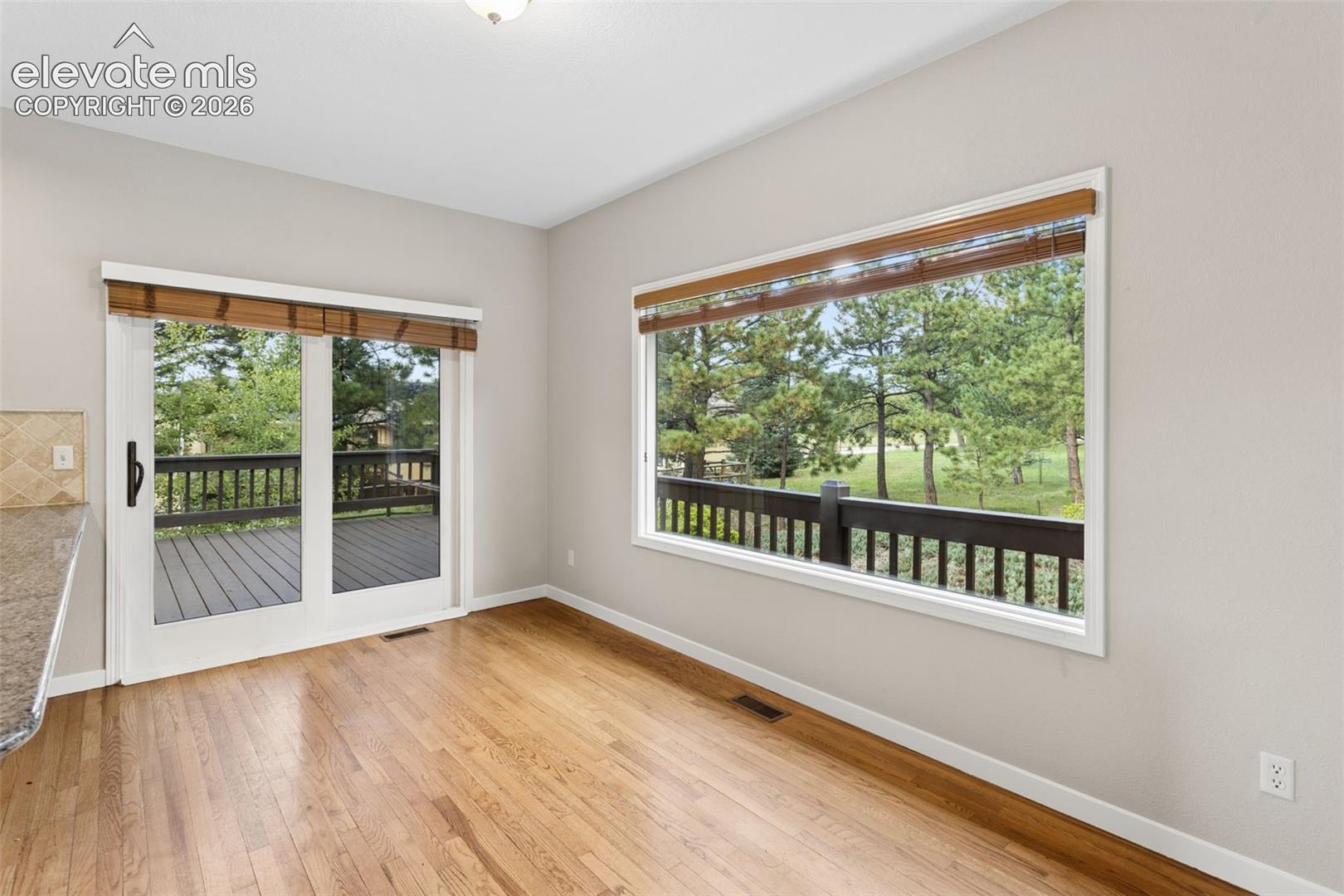 Wood-finish flooring with light wall tones