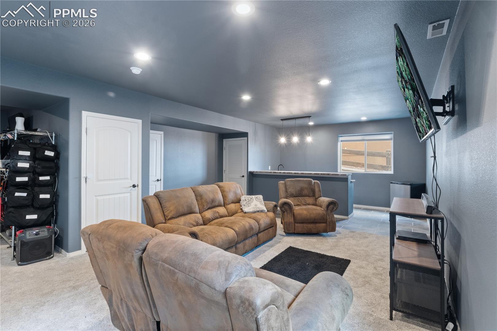 2nd Living room featuring recessed lighting and light carpet