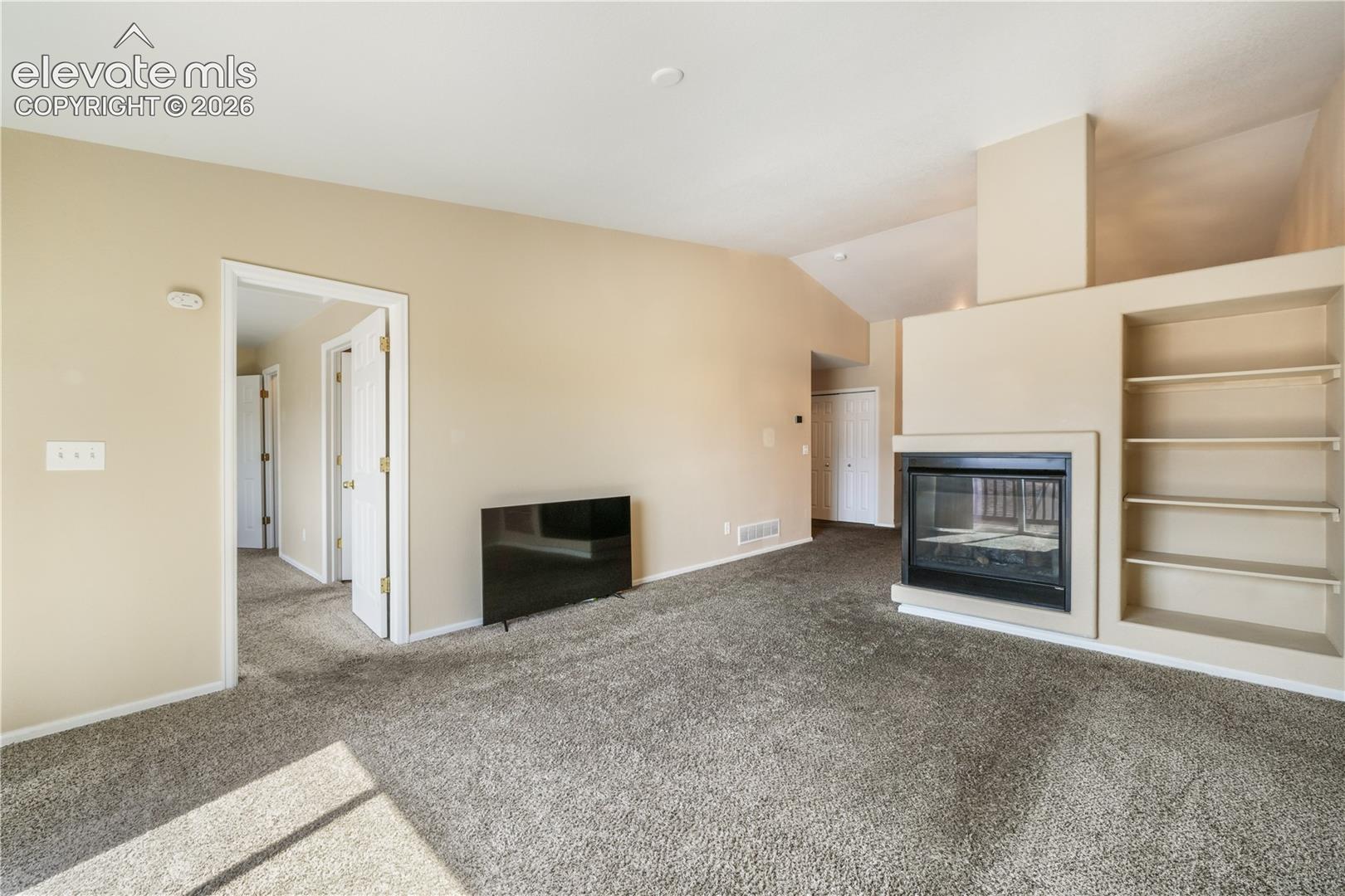 Living room view of gas fireplace