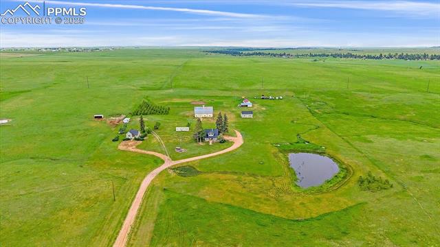 Overview of rural landscape featuring a large body of water