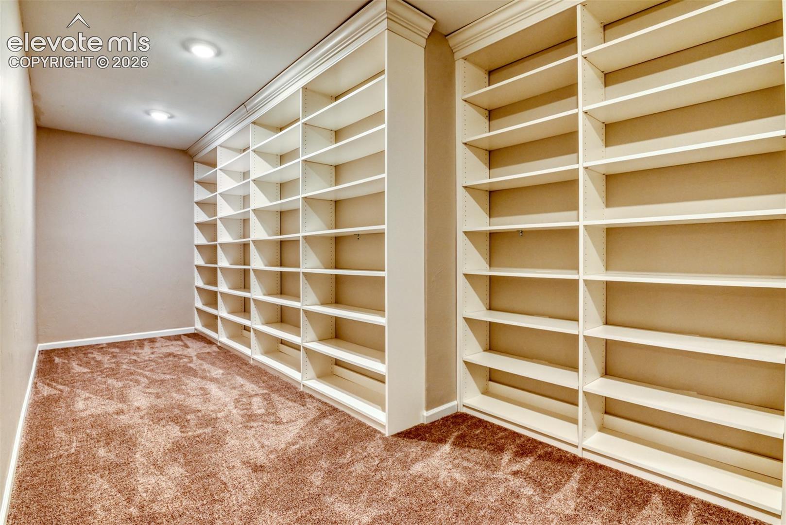 Safe/storage room with built in shelves.