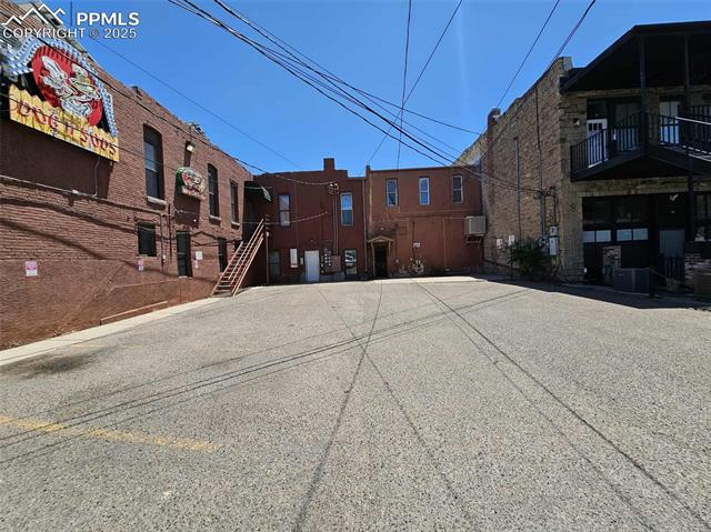 View of asphalt road featuring stairway