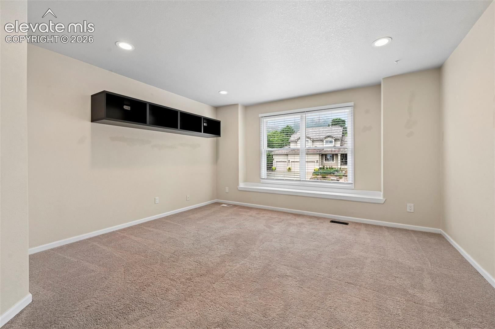 Unstaged bedroom with incredible views of Cheyanne mountain