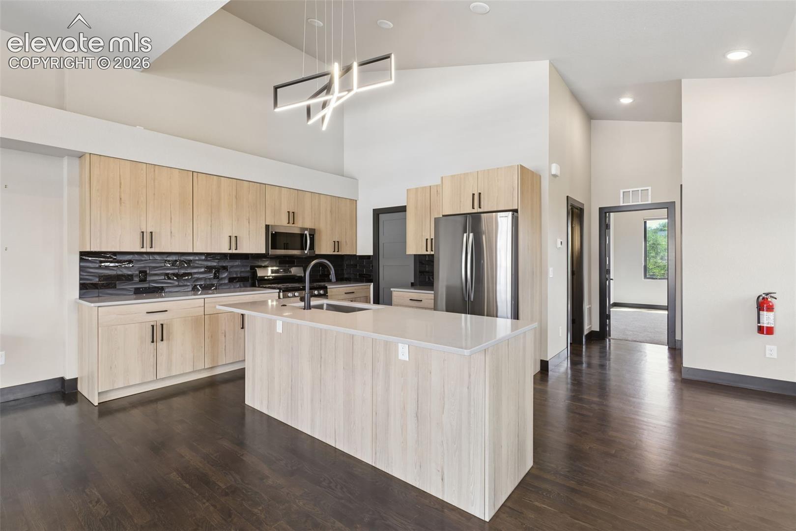 Expansive Island, Abundant Cabinets