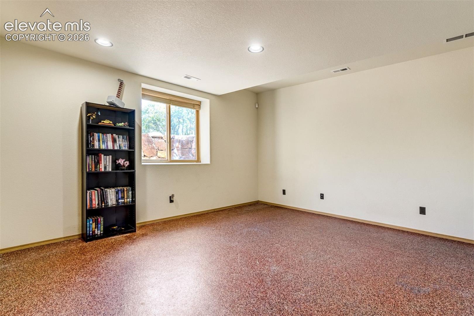 One of two bedrooms in the basement. 