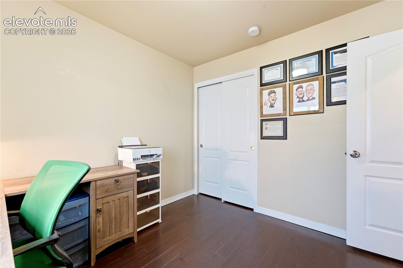 Wood-finish flooring with light-toned wall paint