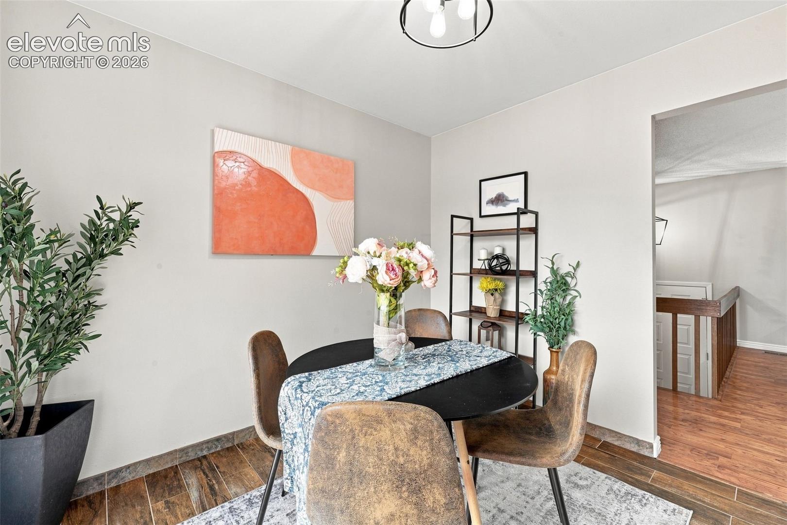 Dining area in kitchen with walk out to back deck