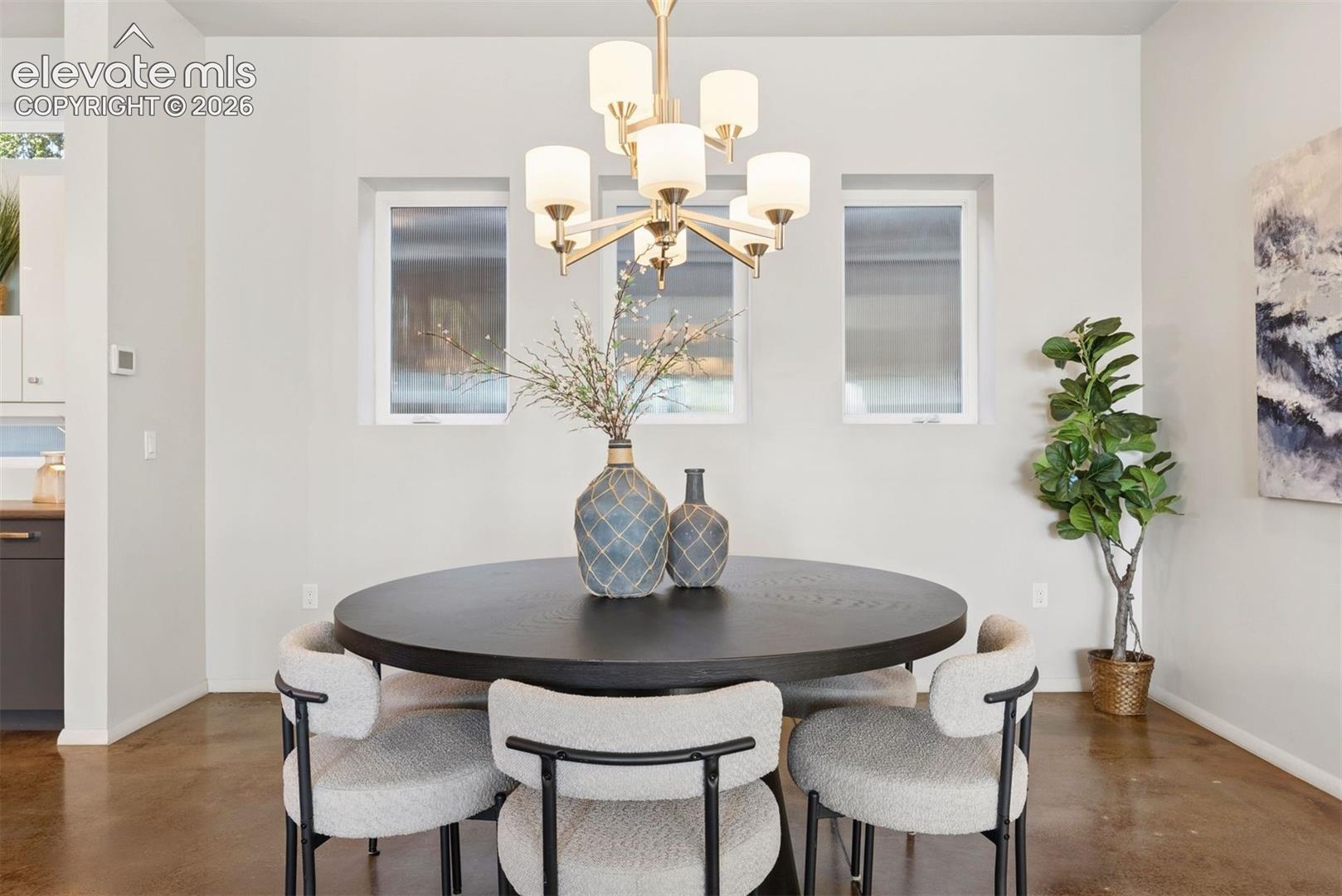 Dining room is casual and sizable. 
