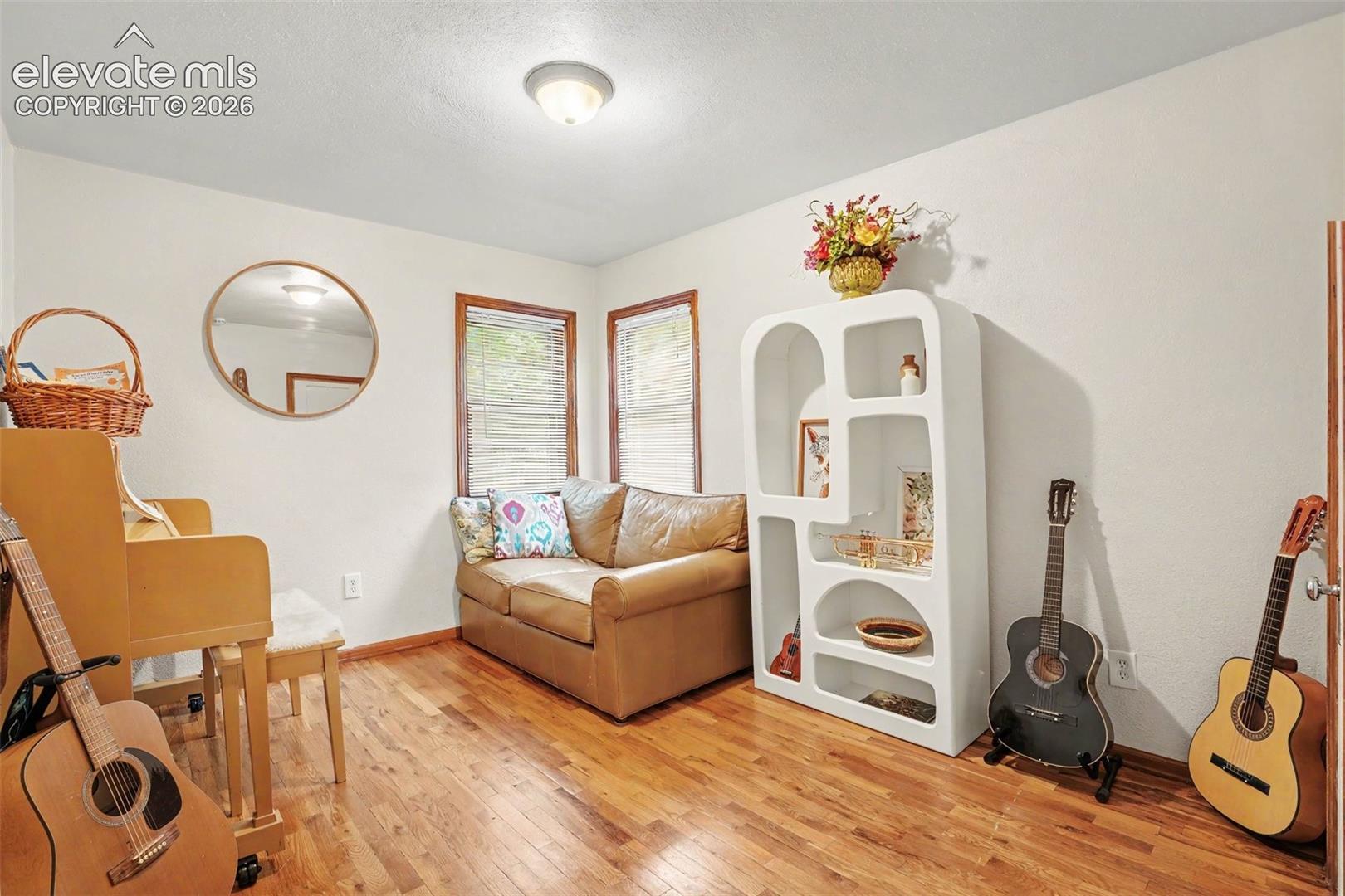 This bedroom is currently used as a music room, but does have its own closet.