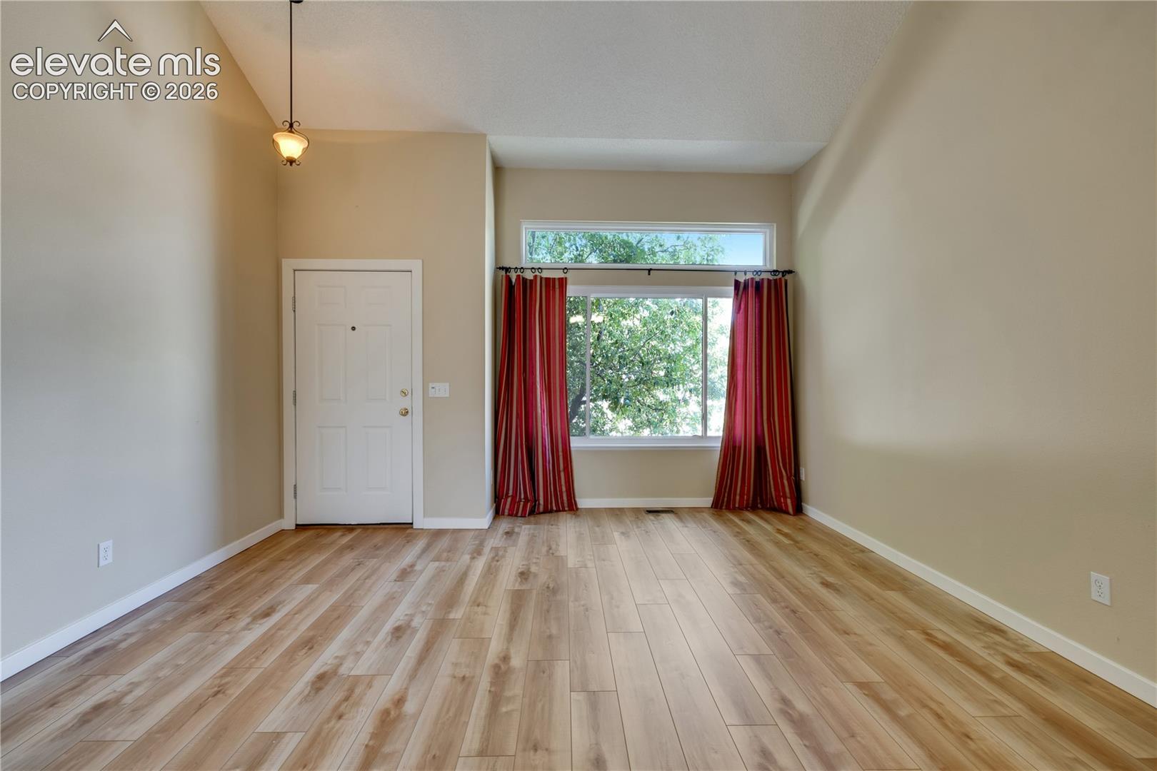 Entry has closet and new luxury vinyl plank flooring