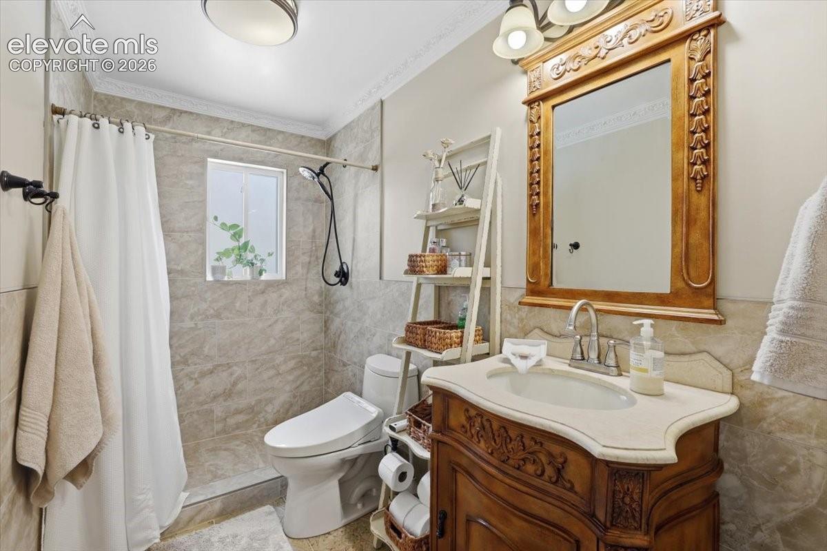 Main level bathroom with a Japanese-style toilet