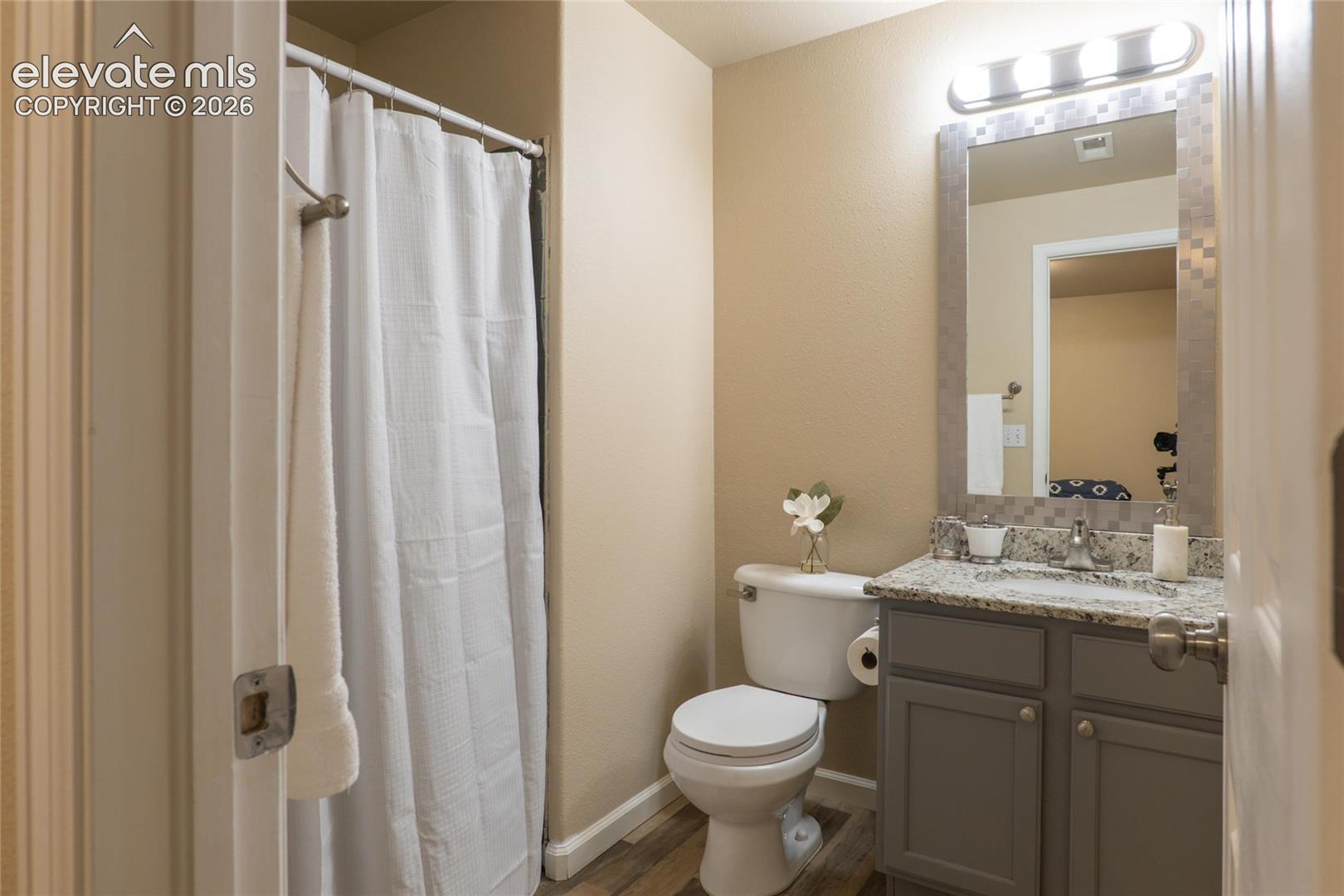 3/4 bathroom adjoining 3rd bedroom in the basement perfect for guests.