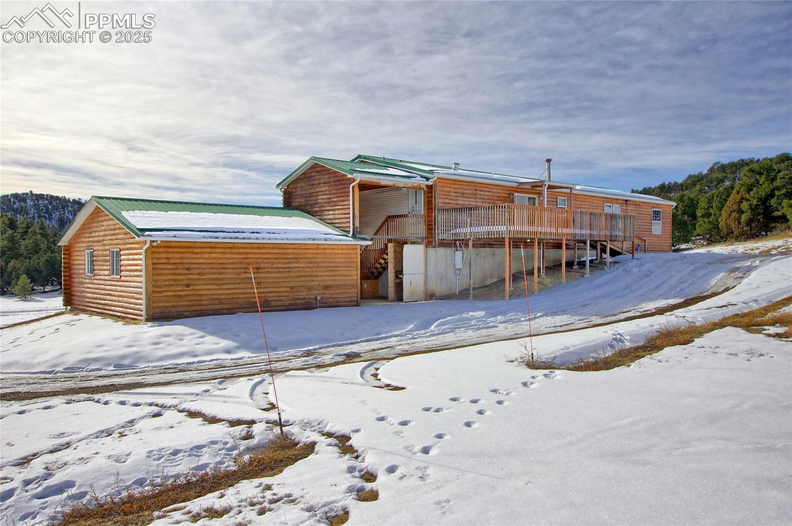 Rear of property with a deck