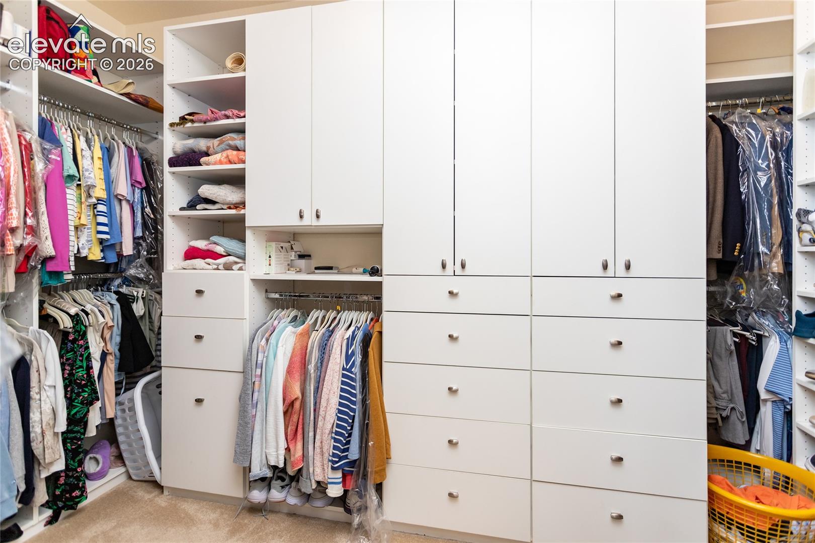 Lots of built-ins in the primary closet....room for everything!