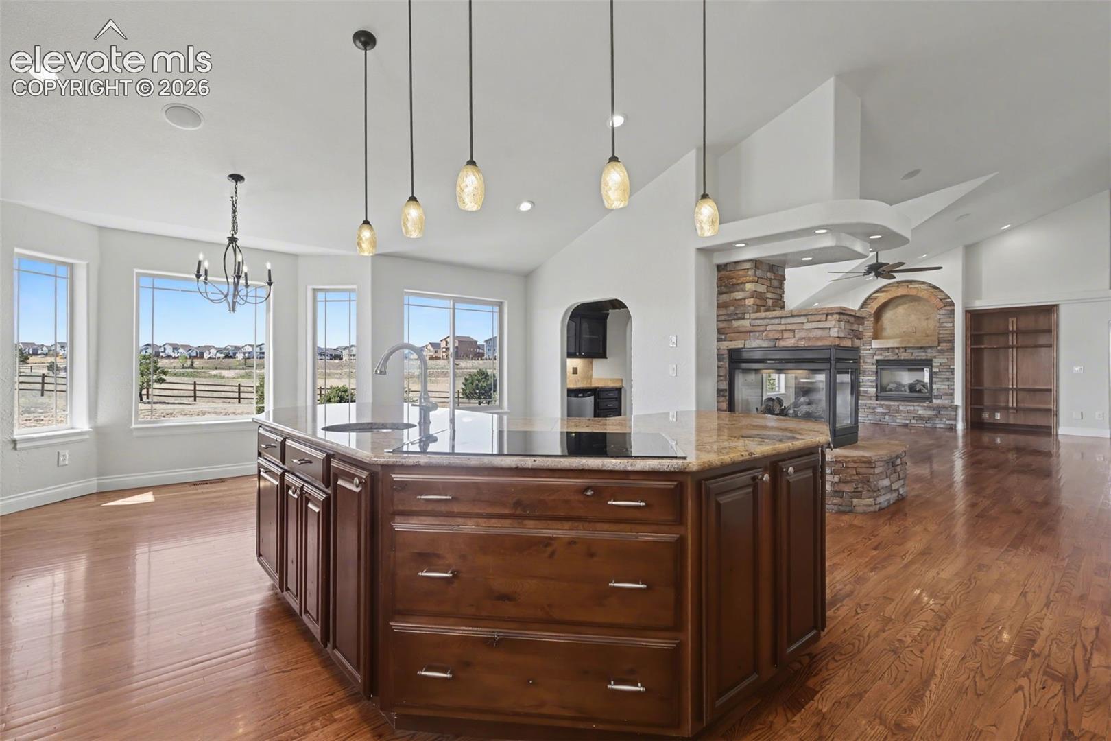Gourmet Kitchen, Large Island, Granite Countertops, Stainless Steel Appliances, Solid Wood Floors, Pull Out Shelving,  Walk-In Pantry