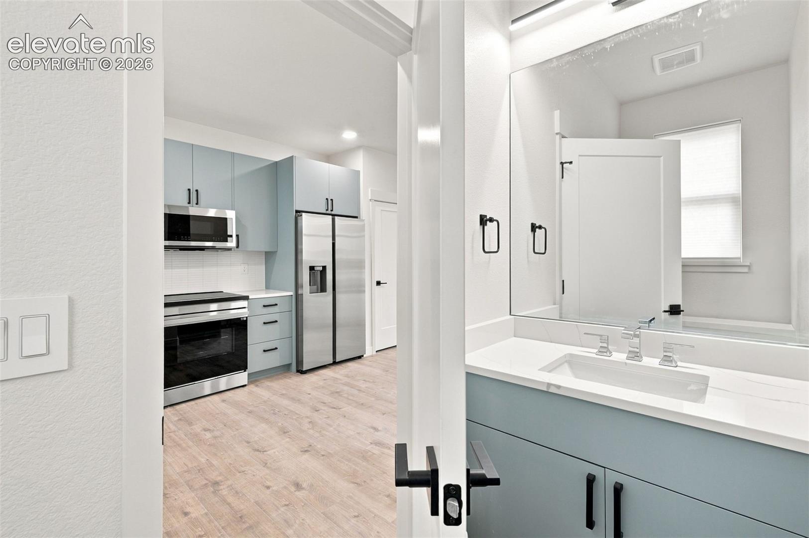 image is from the model unit. subject property has same finishes.