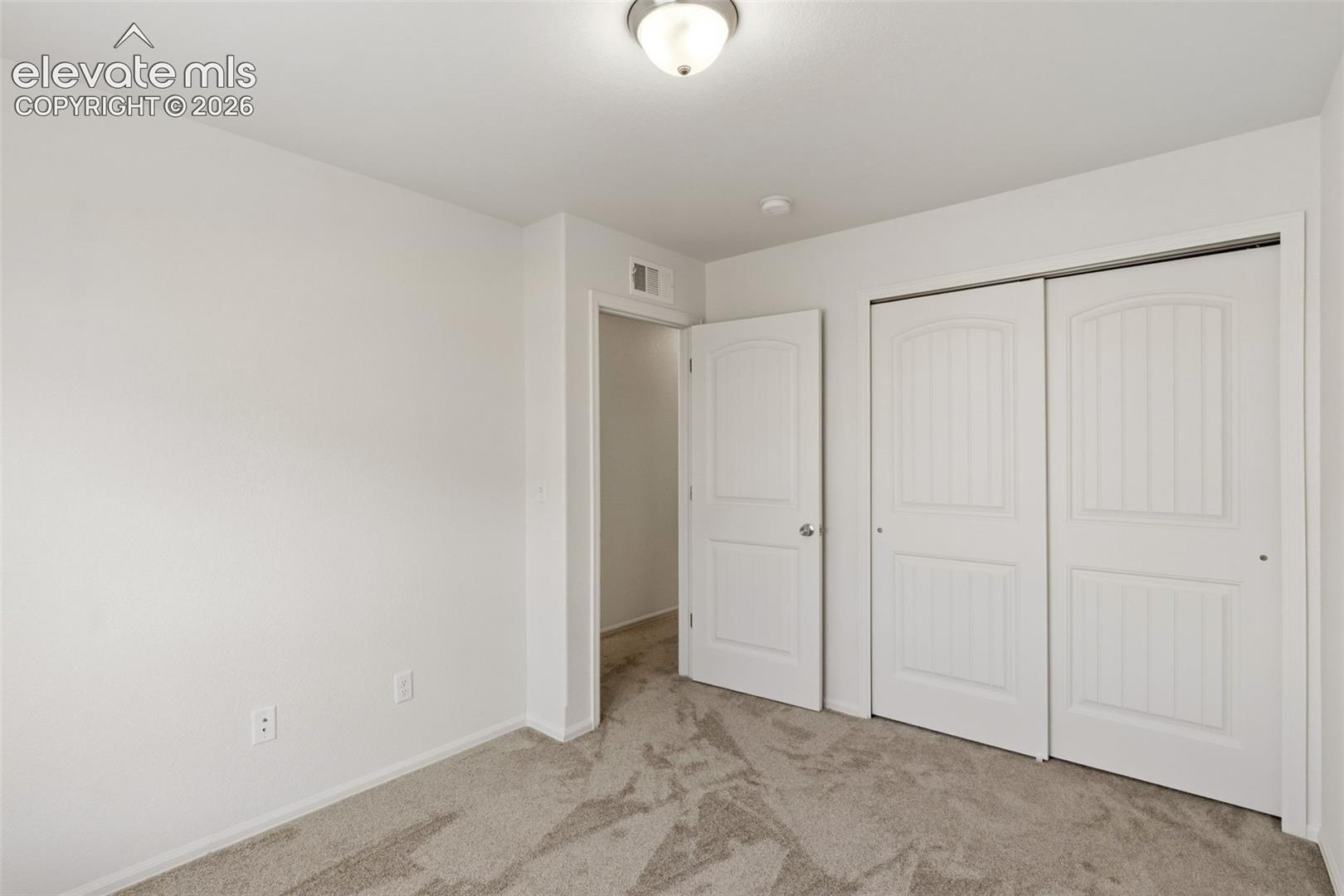 Ample closet space in the secondary bedroom ensures you have all the storage room you need for a growing family