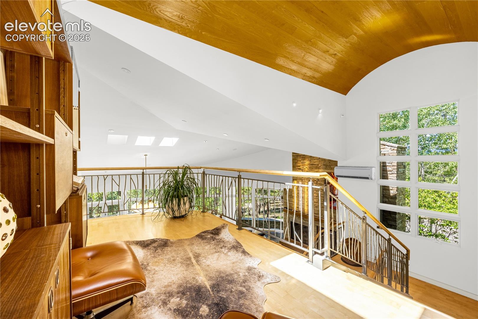 Upper level landing leading to primary suite