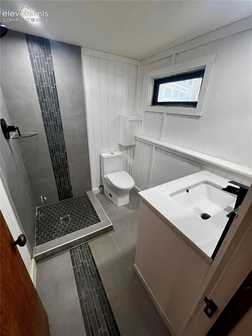  Lower Apt: Great bathroom with custom tile work, window and new toilet and vanity.