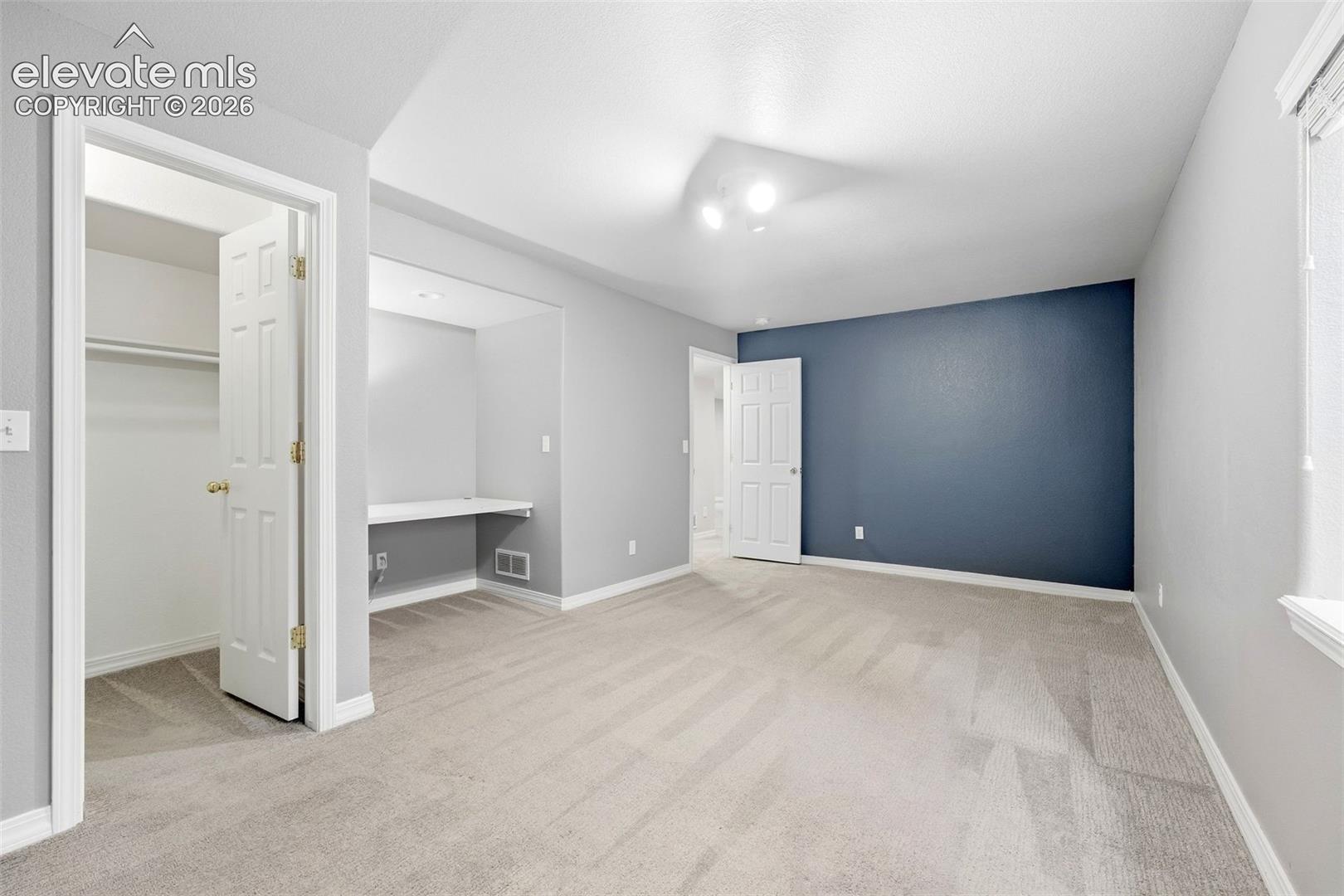 Bedroom 4 in Basement with Built in Desk