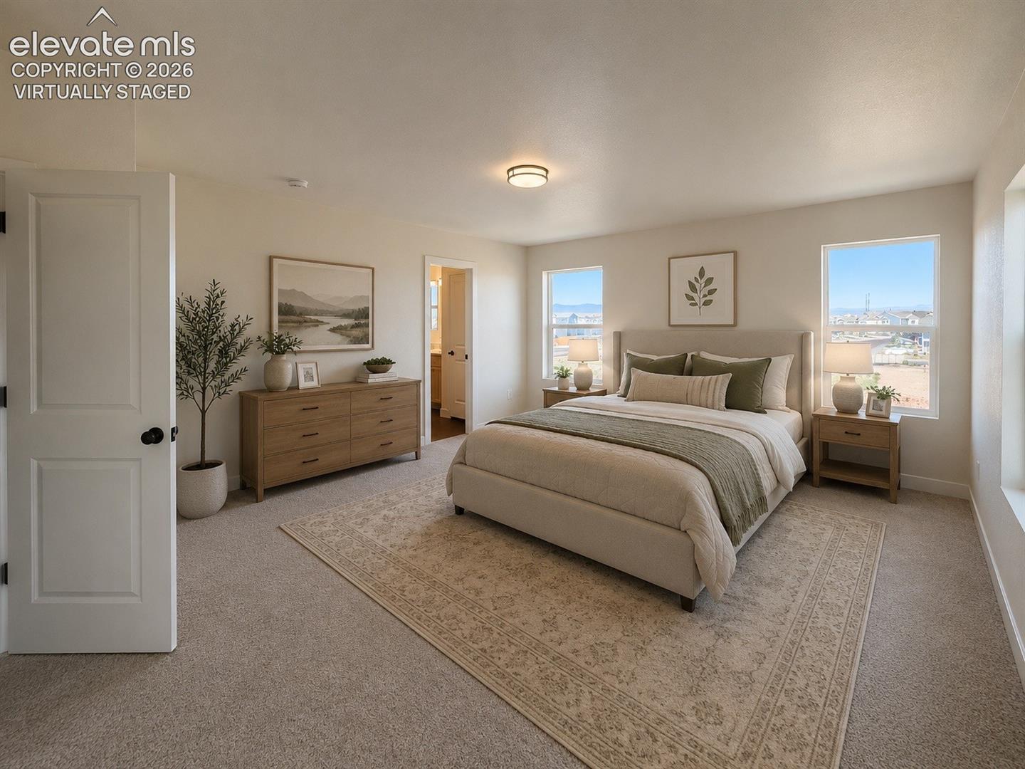 primary bedroom with upholstered bed, two windows, wooden nightstands, and dresser; doorway shows bathroom beyond — virtually staged