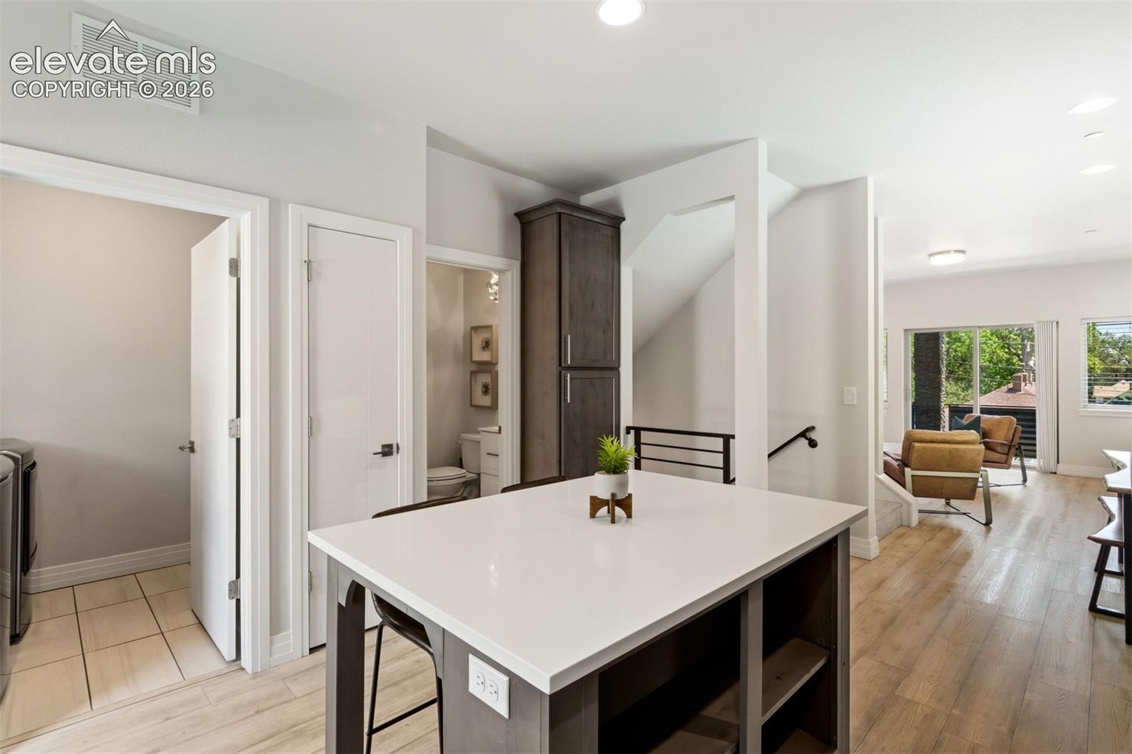 Kitchen with center island walk out access to back yard