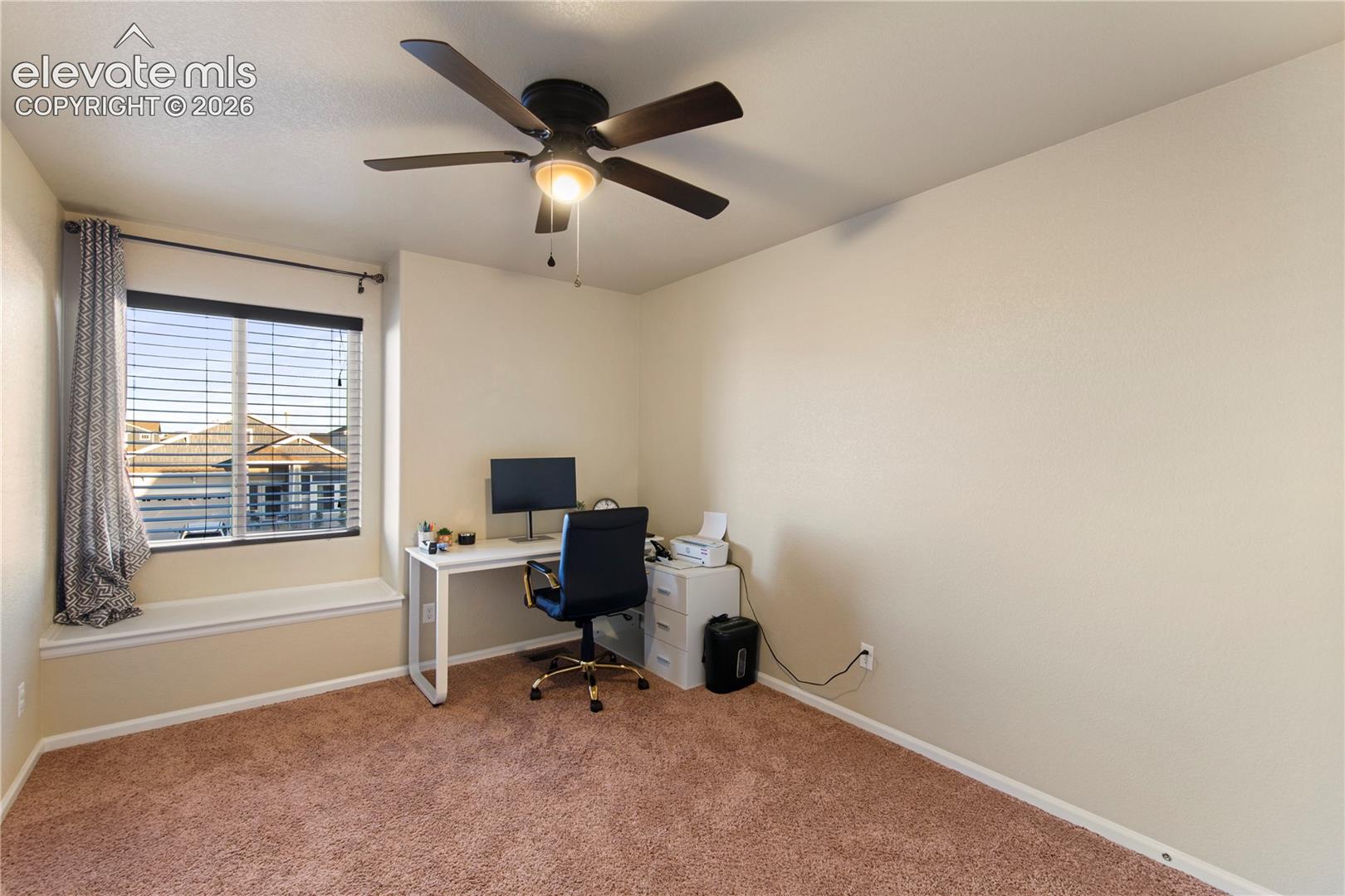 Bedroom #3 upstairs being used as an office
