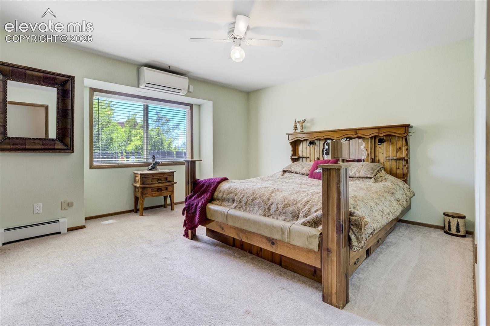 Bedroom 2 with treed views.