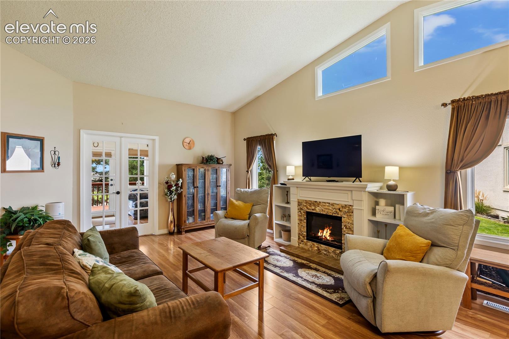 The living room is bright, open and inviting!