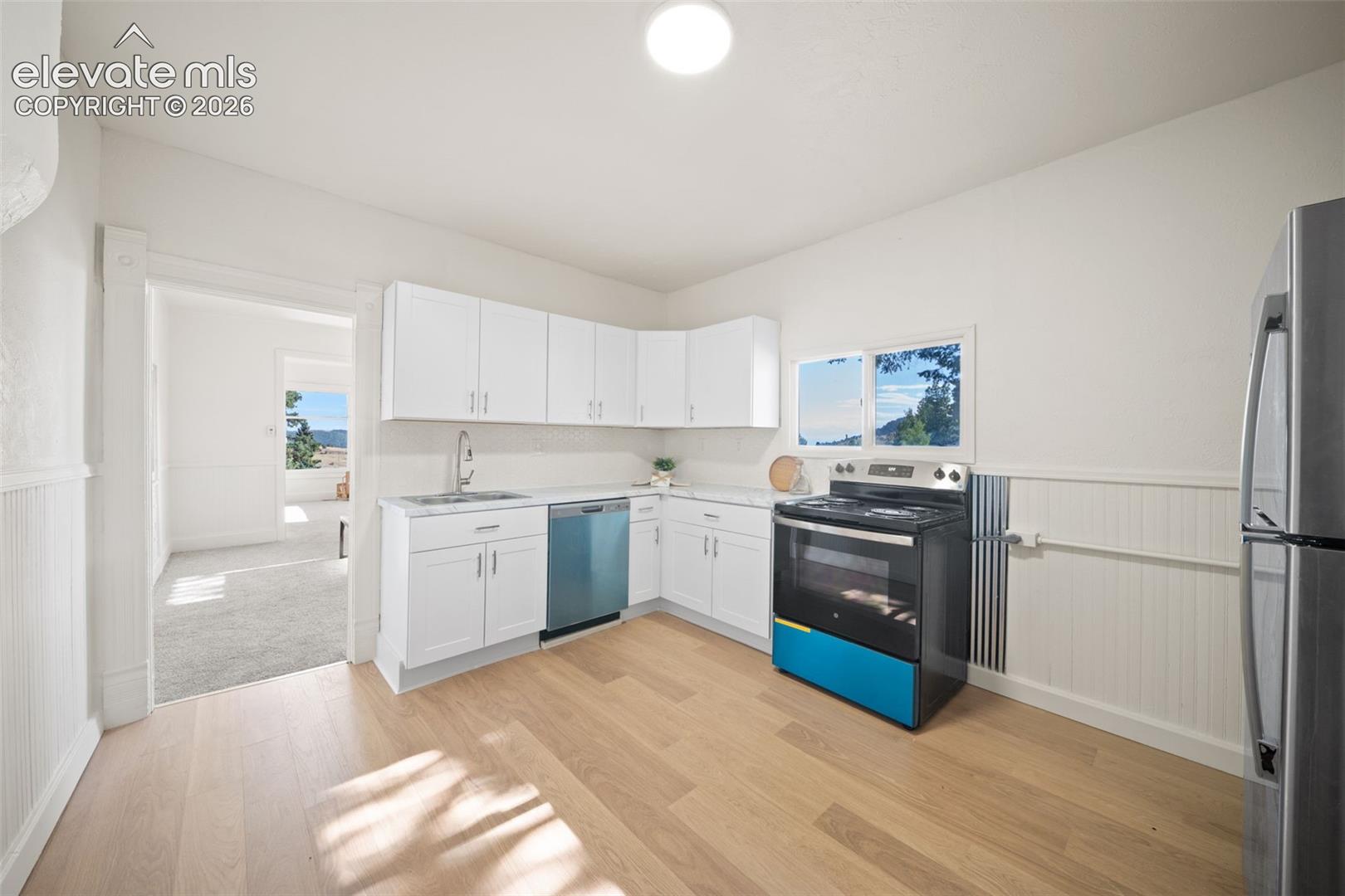 Fresh paint, new flooring, and new appliances