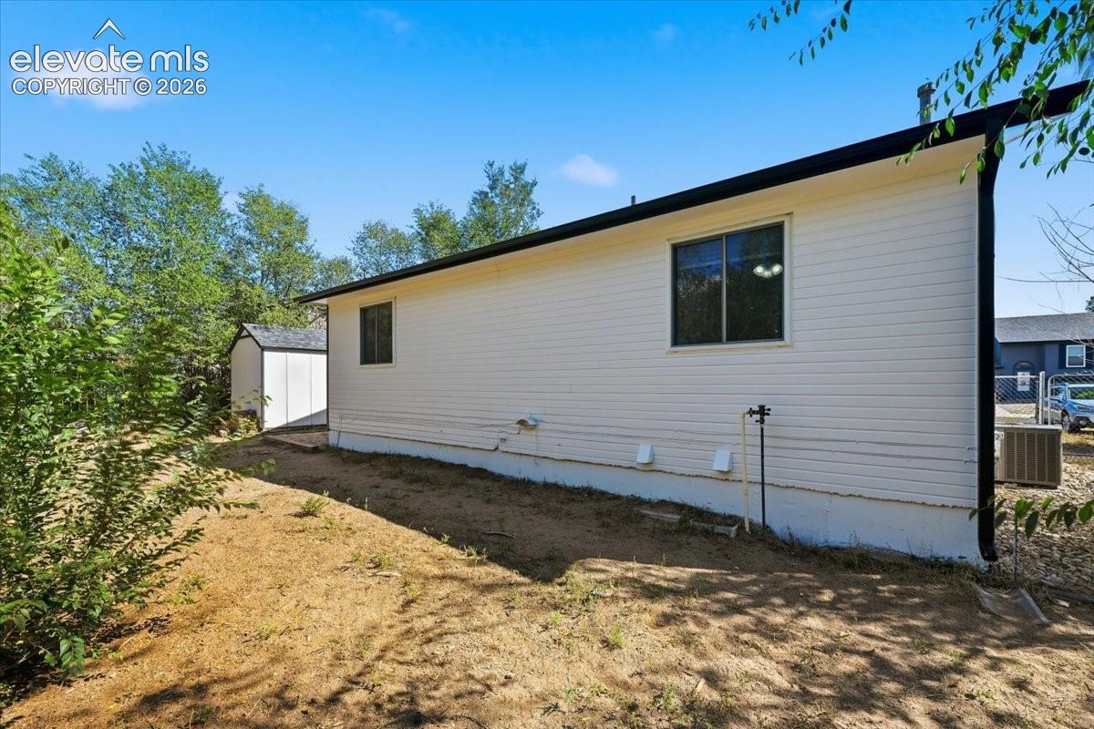 Rear of home and backyard.