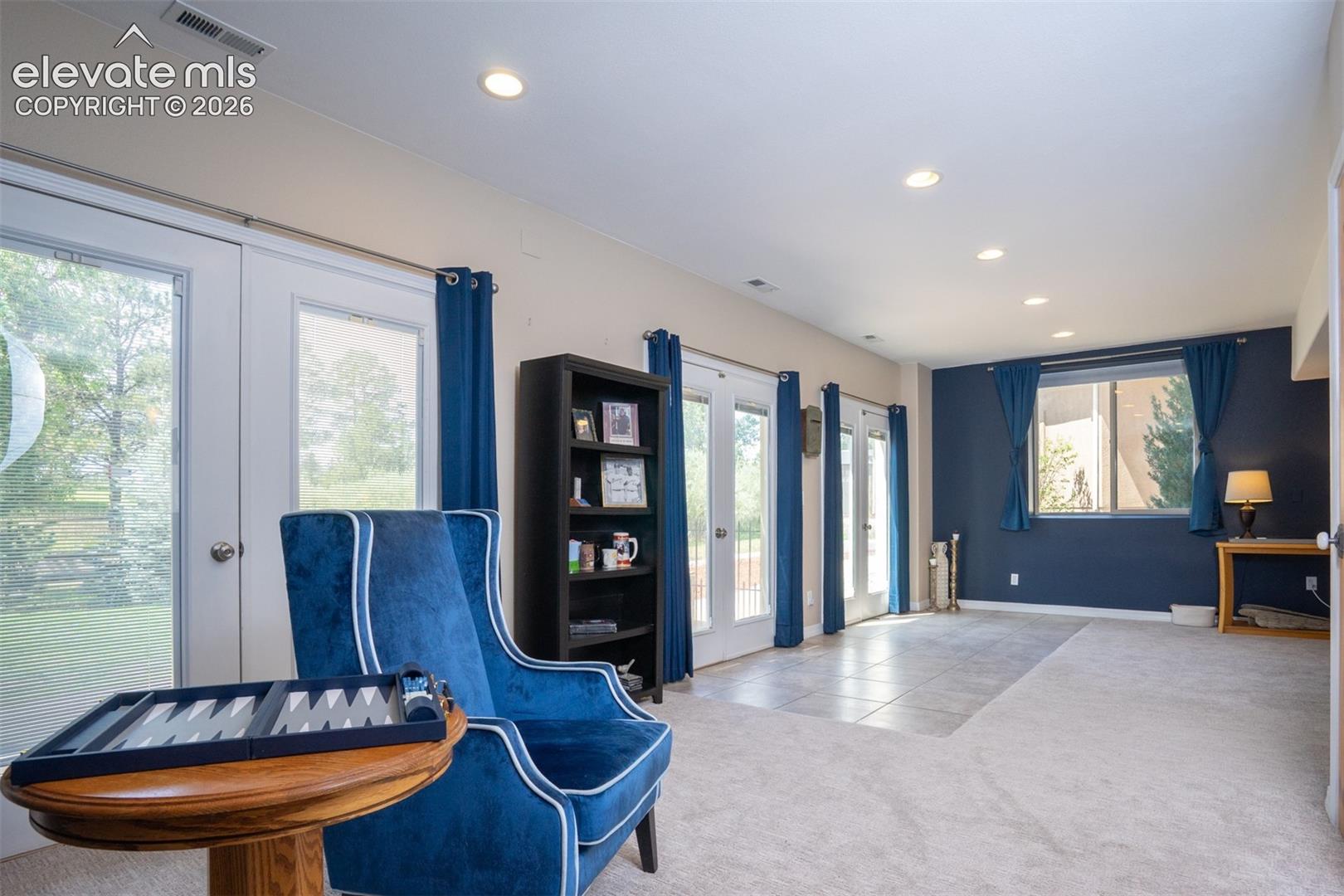 3 large walk-out patio doors spill light into the basement & help keep the basement bright