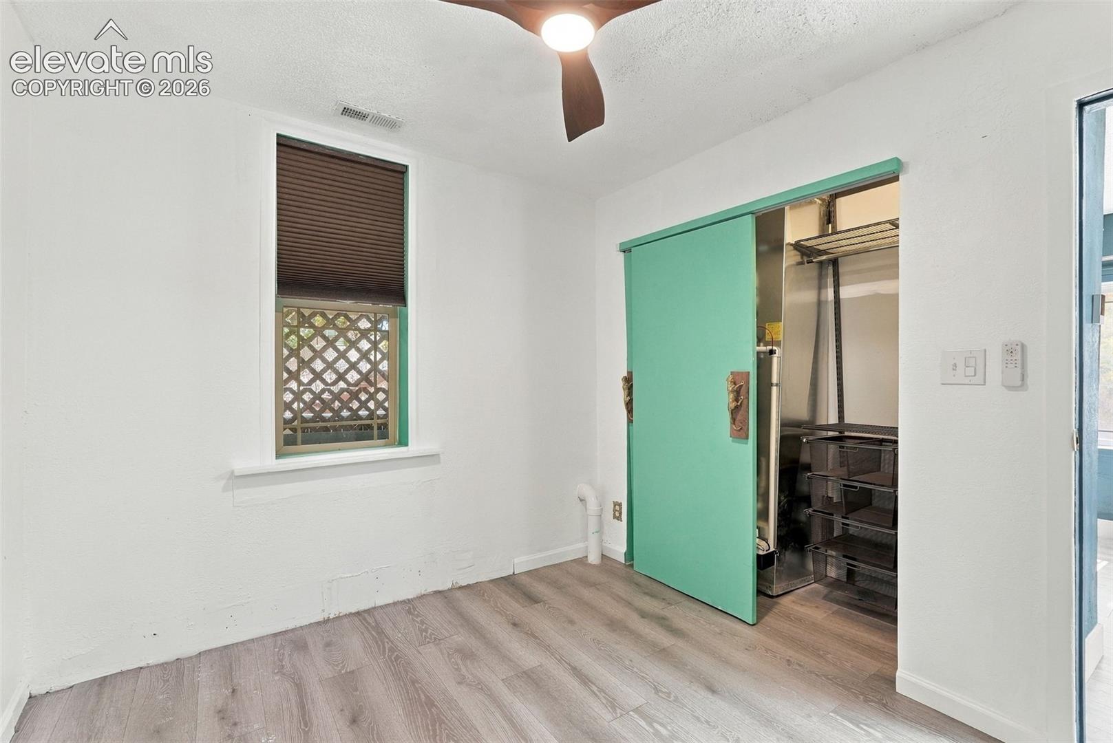 Sliding closet door, and built-in closet shelving