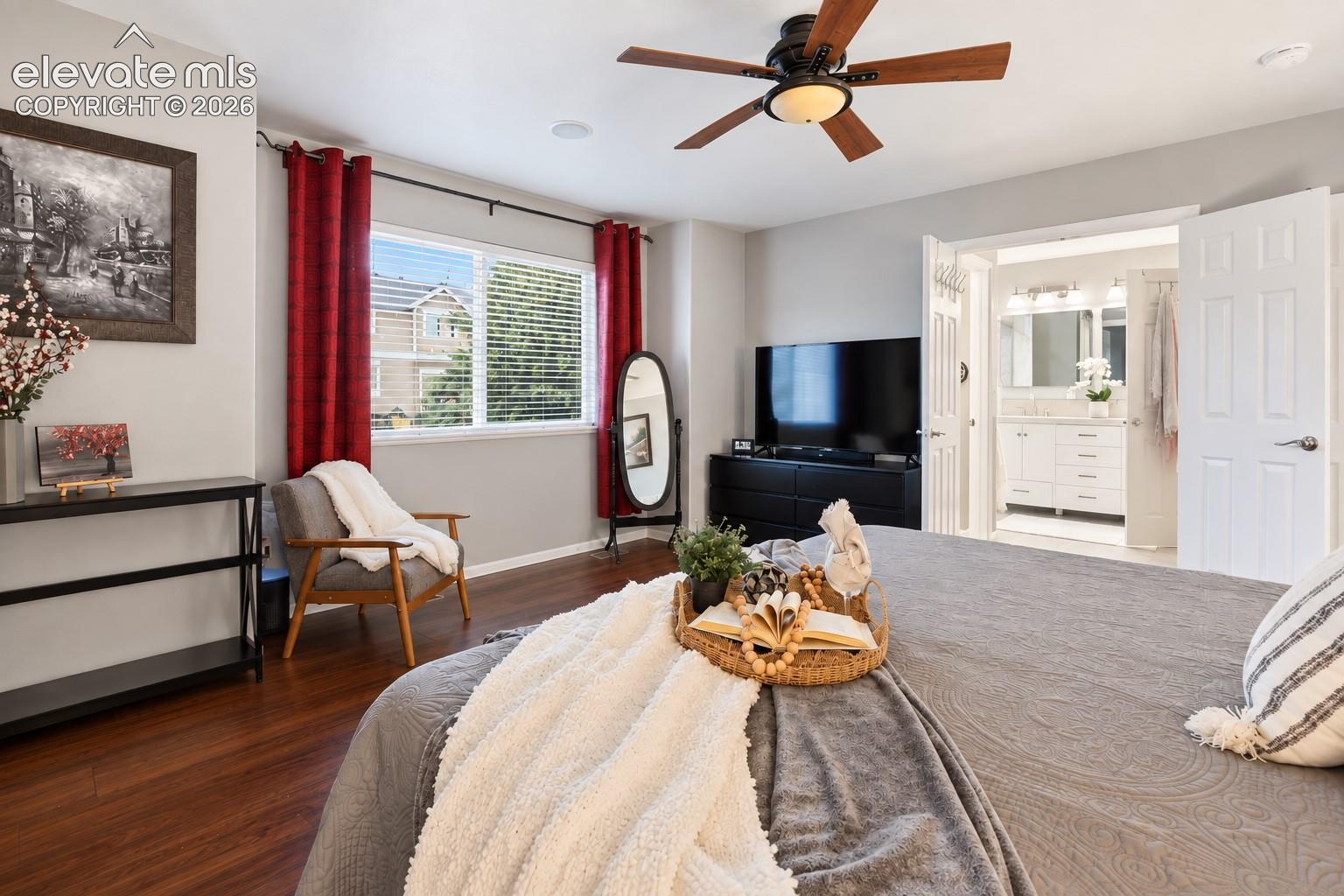 The primary suite enjoys convenient access to its updated private bath.