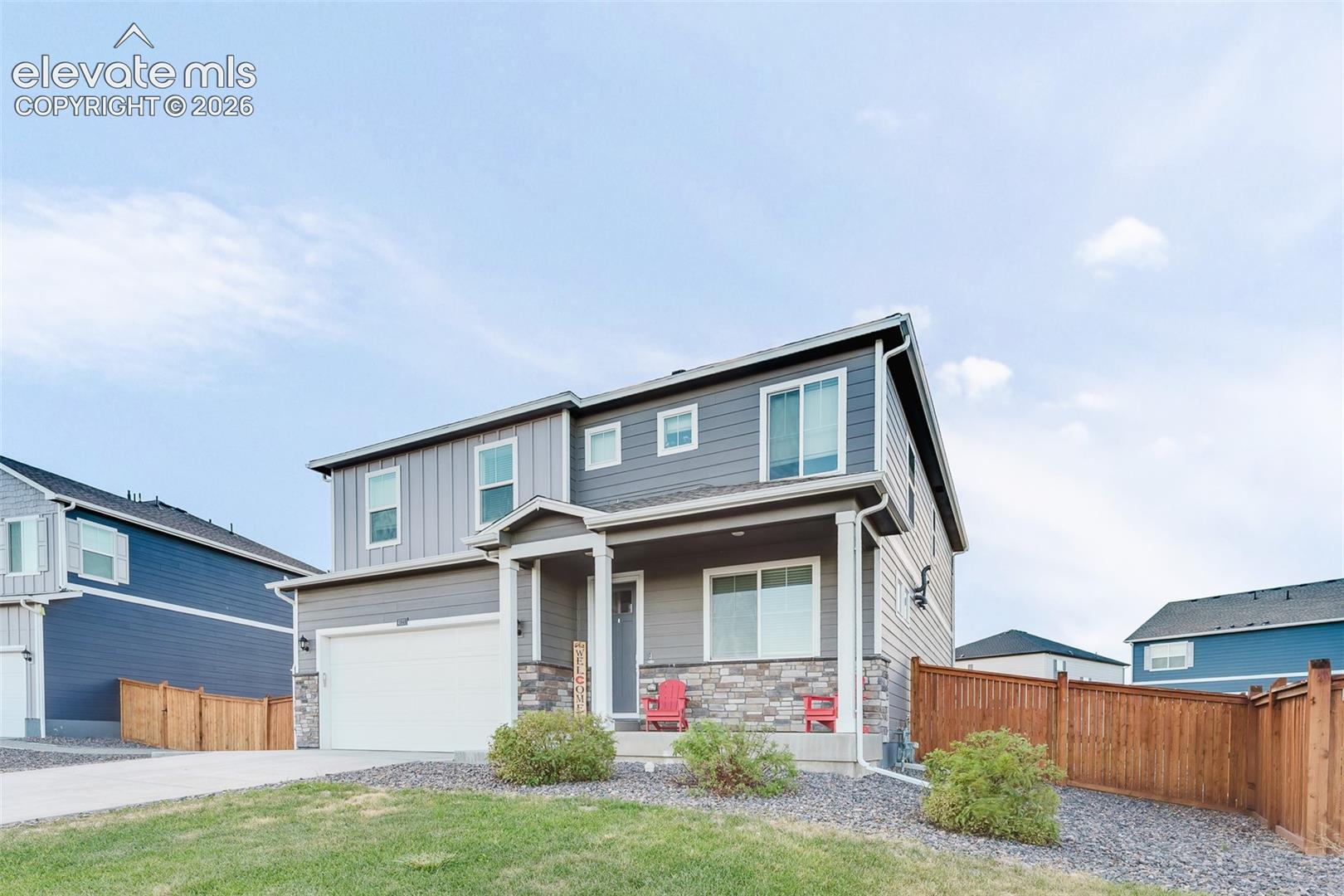Low maintenance xeriscaped yard with covered front porch to enjoy the Colorado sunshine.