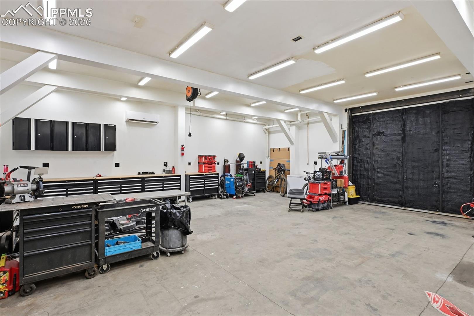 10ft, 8in ceilings and a 6" concrete slab floor.