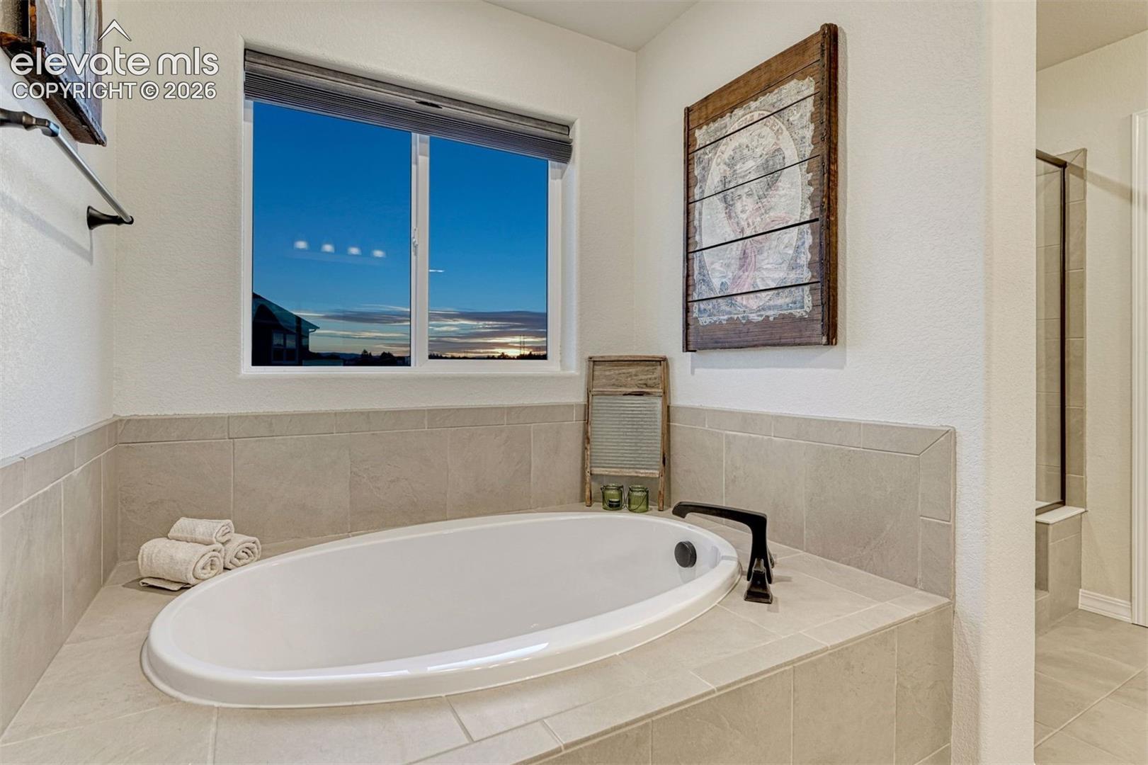 Soak and Sunsets make the most of this Spa bath