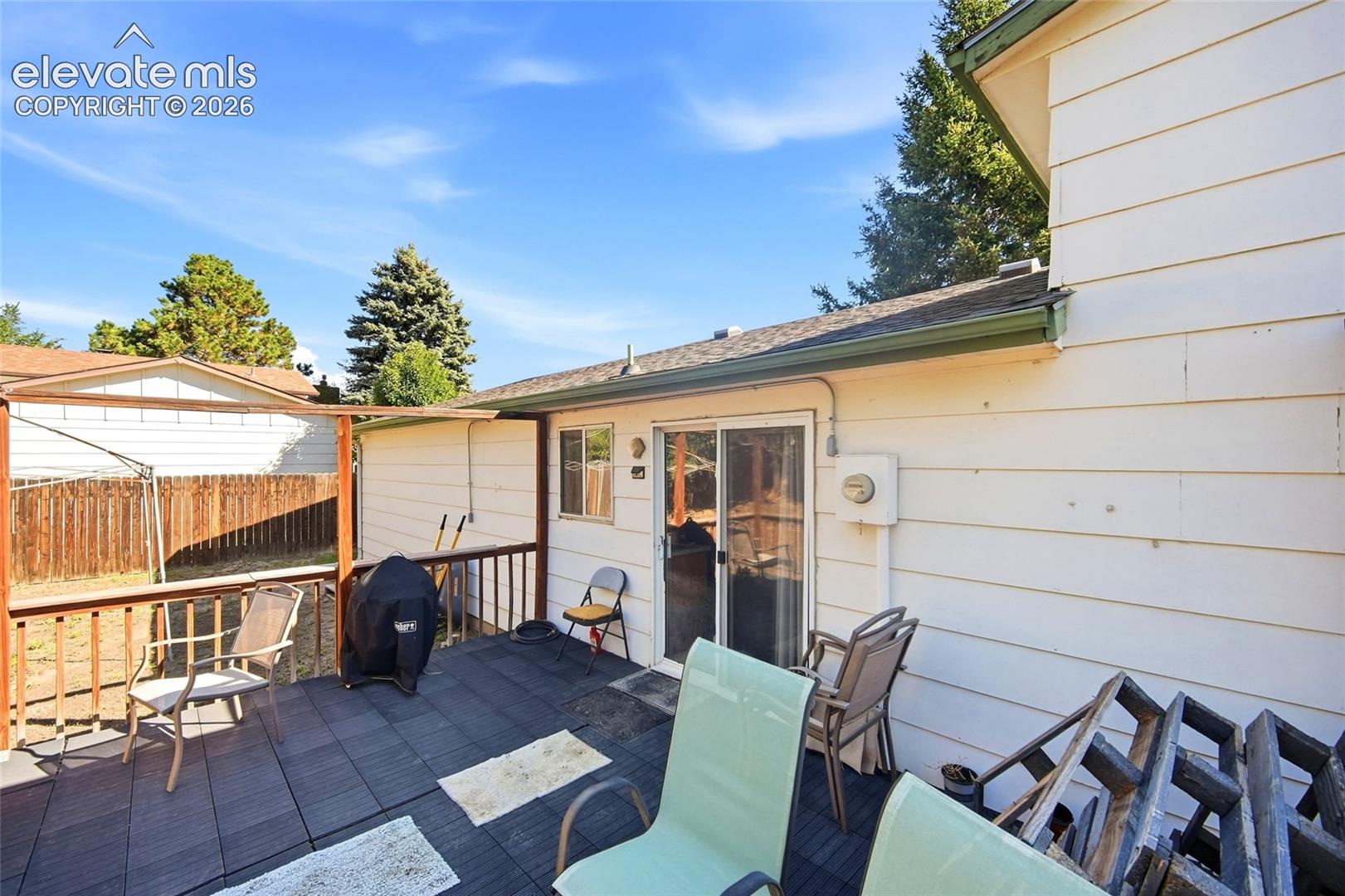 Rear yard with view of rear deck