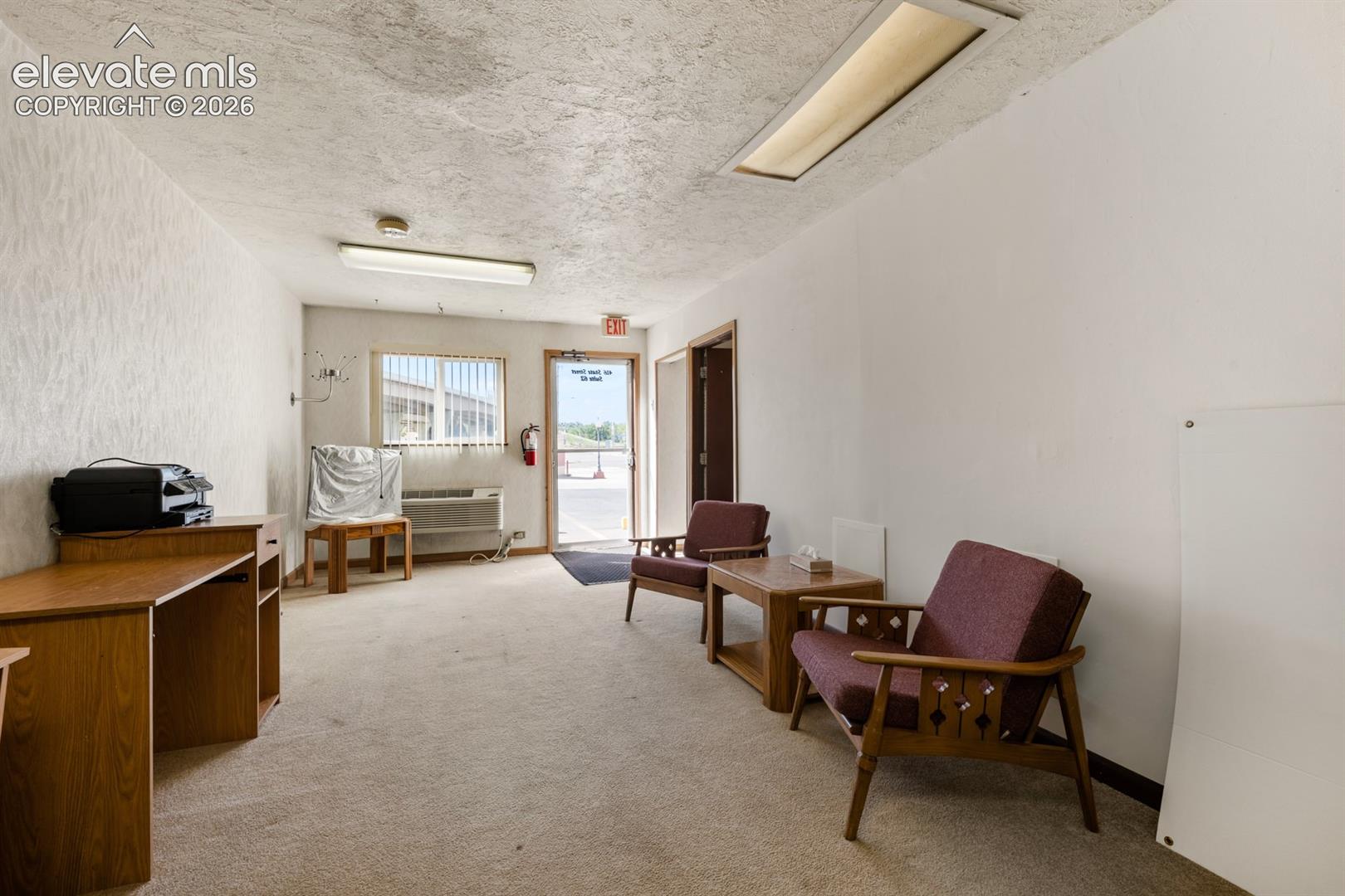 Additional office space that could be great for a Well Clinic, spa or manicurist