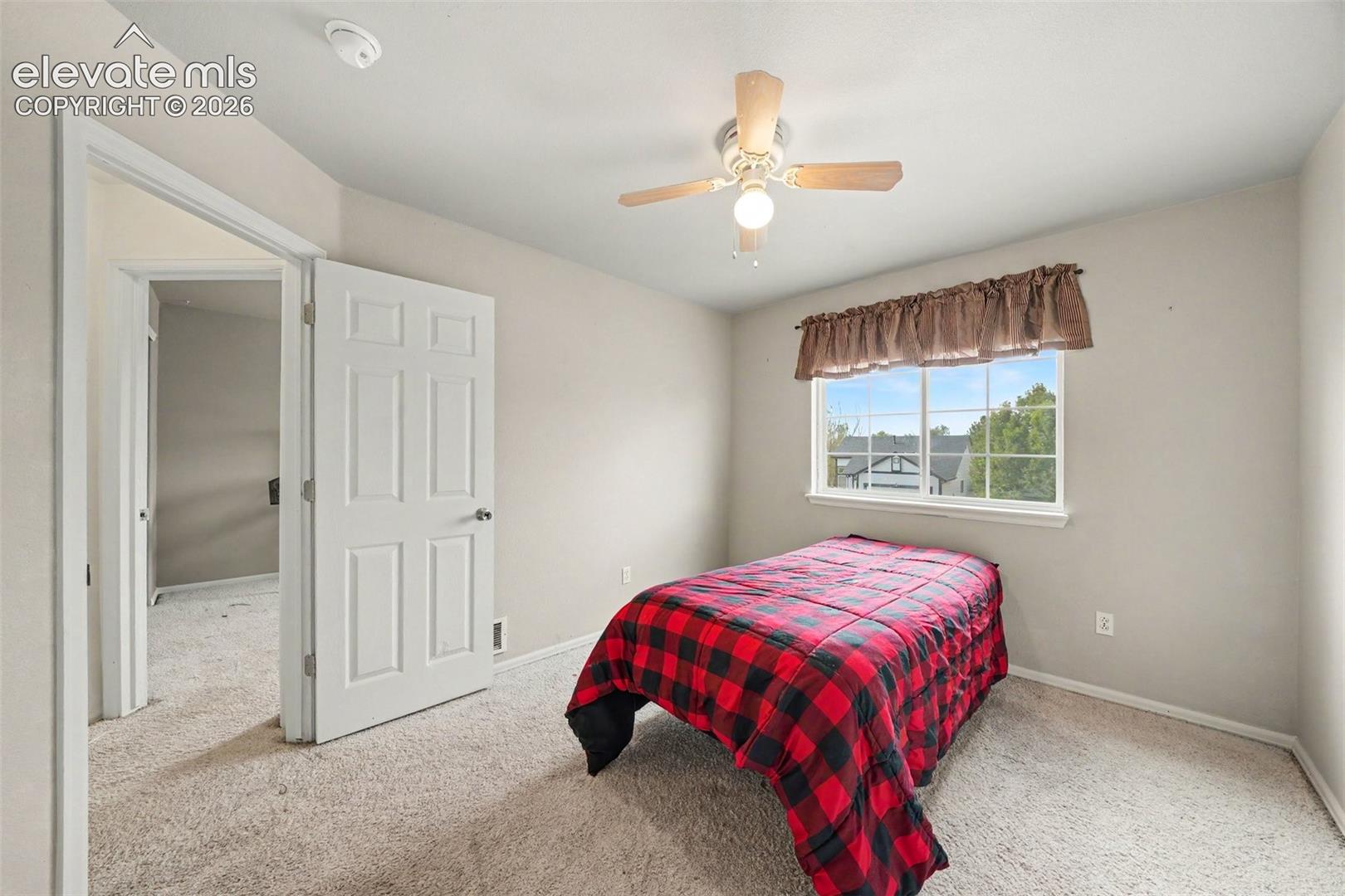 Bedroom #3 with a ceiling fan/light fixture