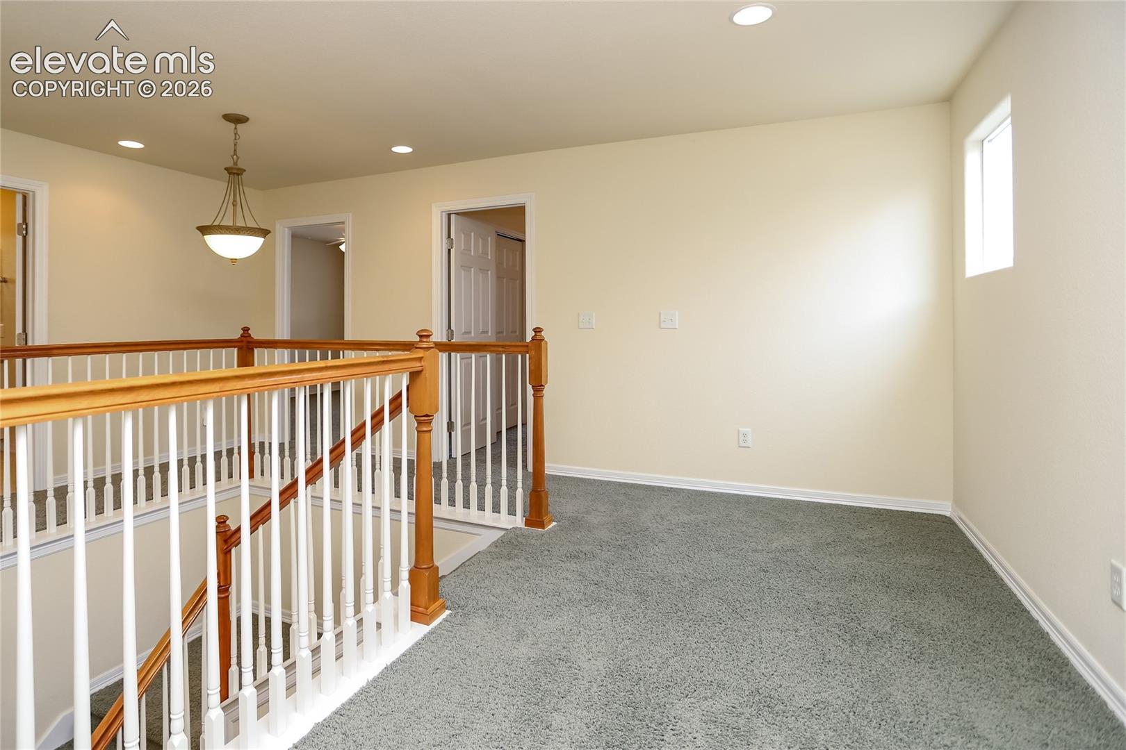 As you walk up the stairs, loft area offers multi use possibilities!