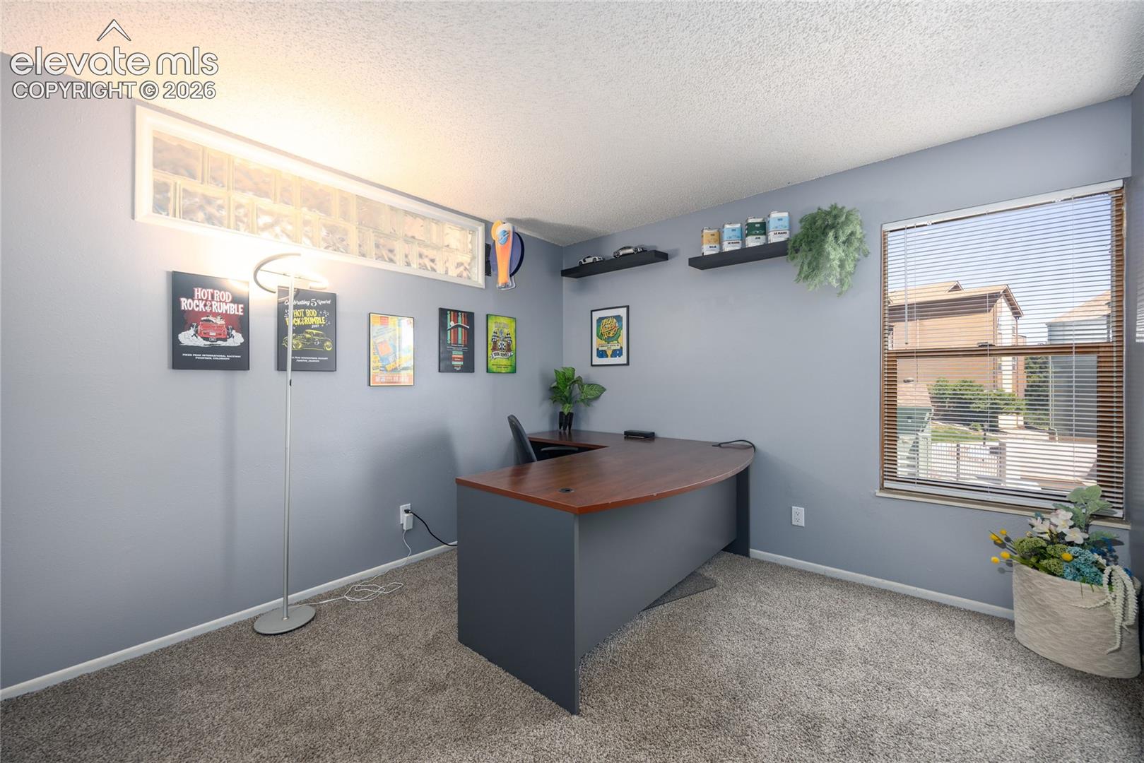 2nd Bedroom is being used as an office.